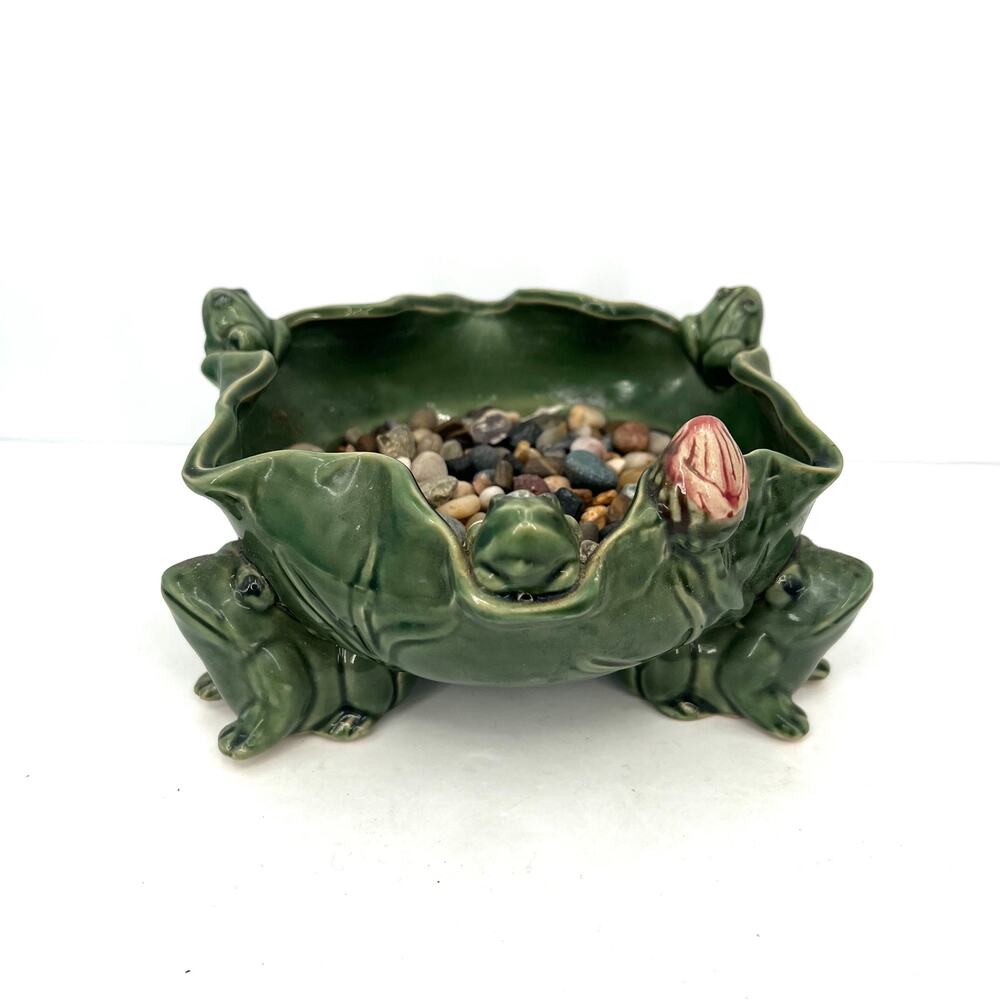 Ceramic footed lily pad with sculpted frogs perched on the edges bowl planter.